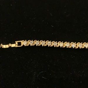 Gold and diamond tennis bracelet